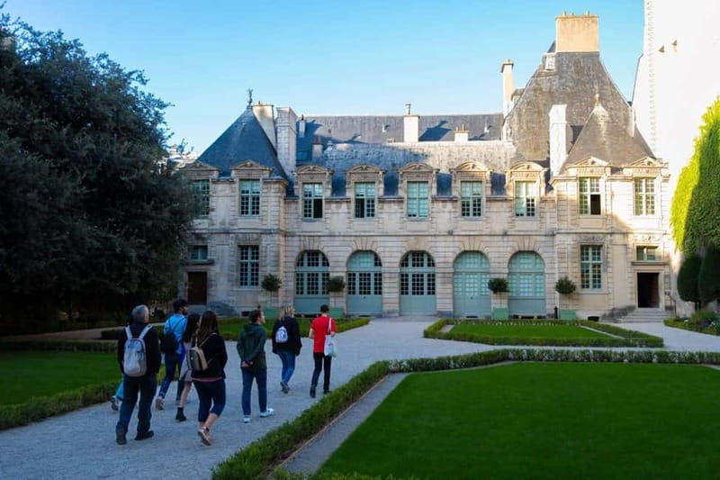 Explore the Marais: Culture, History & Hidden Gems of Paris - Place des Vosges: Victor Hugo’s Square and the Walk’s Best Photo Window