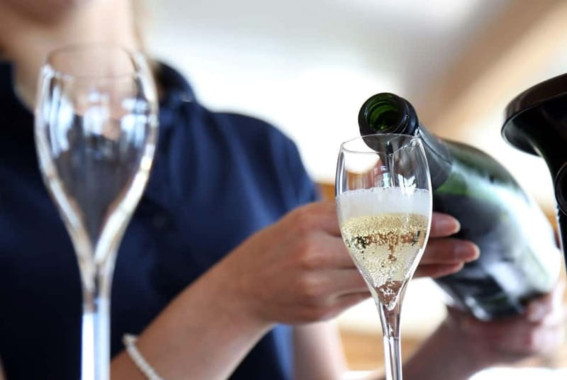 From Paris: Champagne Day Trip with 7 Tastings and Lunch - First Champagne House Stop: Cellars, Production, and Your First Flight