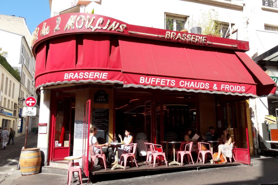 German private Walking Tour through Montmartre & Passages - From hill to boulevard: Grands Boulevards views and the city’s big tempo