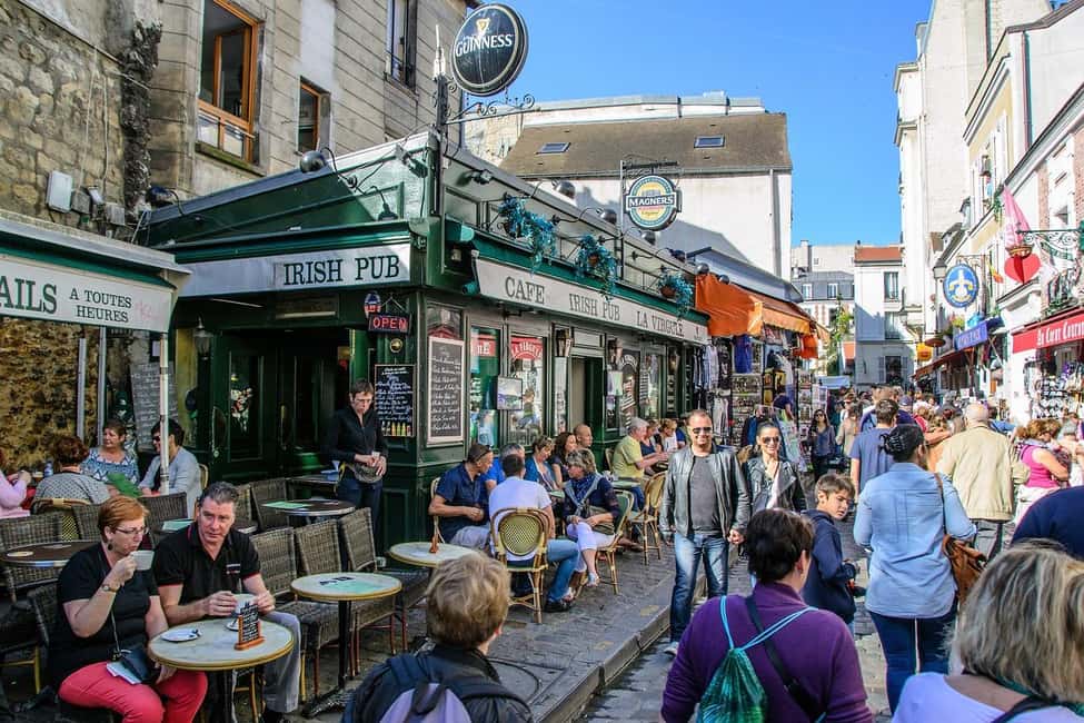 Montmartre Walking Tour with a Local Guide - Place du Tertre: where you watch art happen, not just buy it