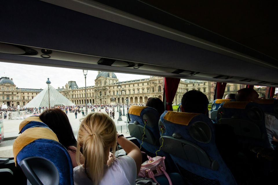 Paris: Audio-Guided Bus Tour & Seine River Cruise - The Seine cruise: a glass-enclosed trimaran with narrated commentary