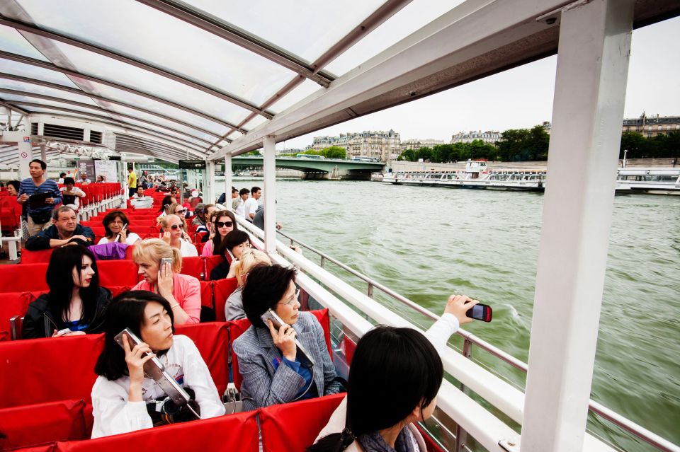 Paris: Audio-Guided Bus Tour & Seine River Cruise - Eiffel Tower ending—and the backup plan