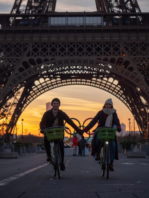 Paris Before the Crowds: Sunrise Bike Tour with Breakfast - Louvre Pyramid in the early light: why that stop feels different