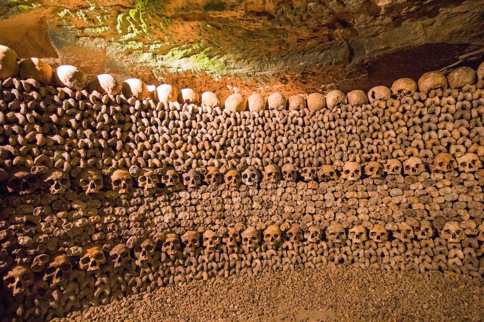 Paris: Catacombs Entry & Seine River Cruise with Audio Guide - Walking the Paris Catacombs with an audio guide