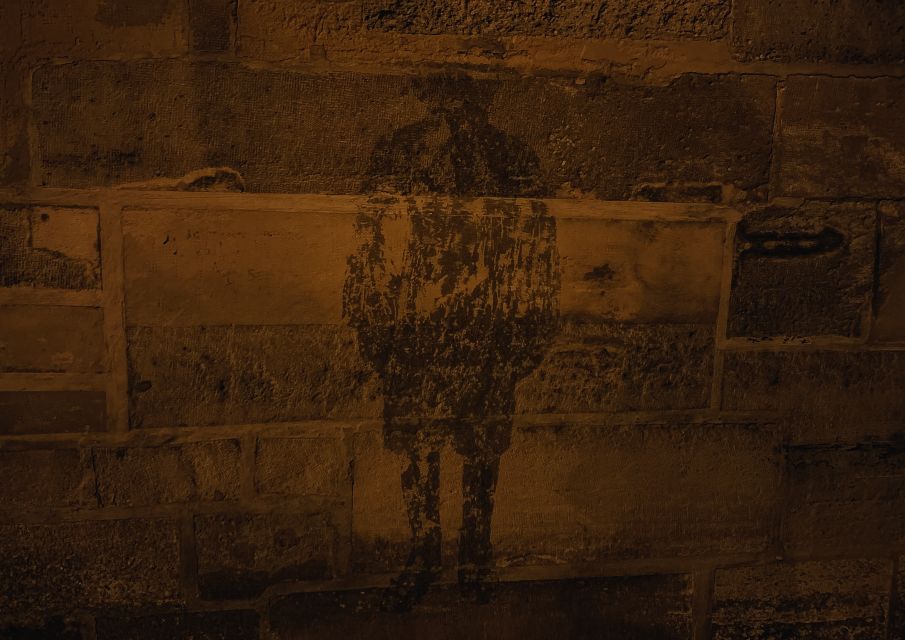 Paris: Dark History and Ghostly Guided Walking Tour - Notre-Dame exterior: demons, symbols, and the art of looking closer