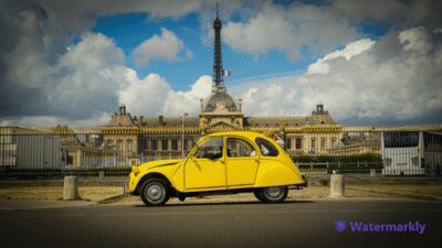 Paris: Discover Paris 2CV - The pickup game: free central hotel/restaurant pickup