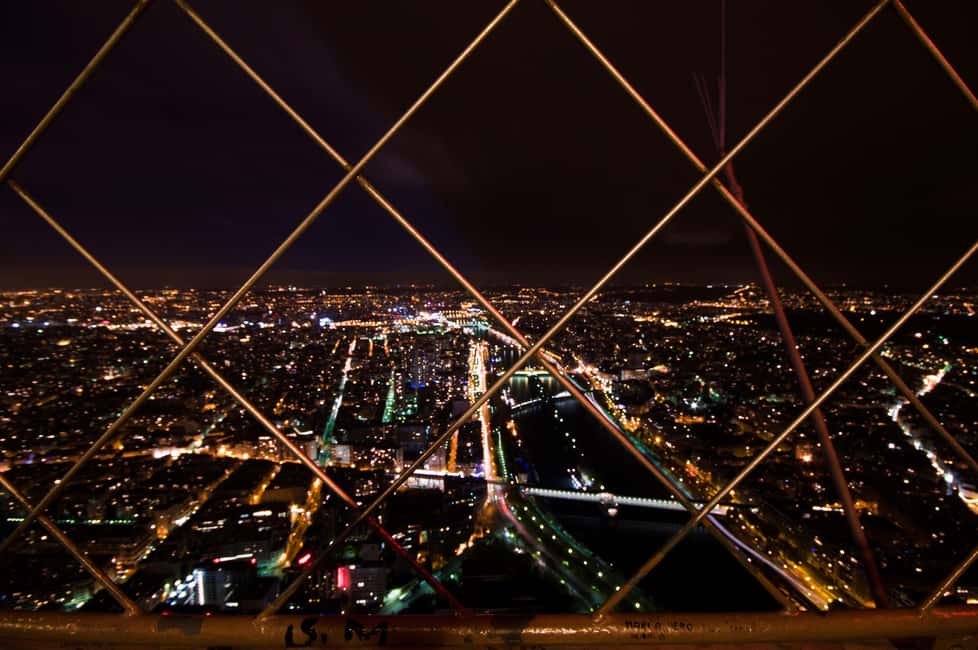 Paris: Eiffel Tower Guided Tour|Summit & second floor access - First Floor Stops: Exhibits, Shops, and the Tower’s Daily Life
