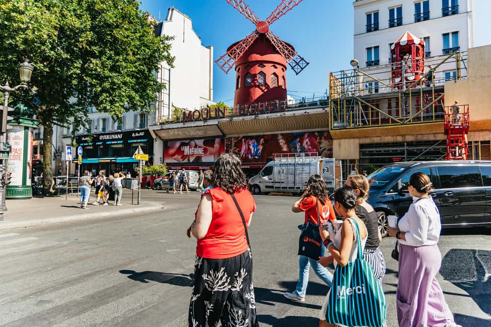 Paris: Hidden Gems of Montmartre with Local Guide - Moulin de la Galette: the hill-top rhythms behind the buildings