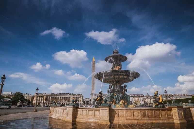 Paris: Louvre Museum Entry Ticket and Garden Walking Tour - Getting Oriented: From the Louis XIV Statue to the Louvre Pyramid