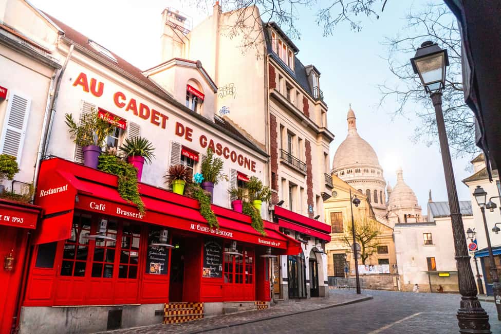 Paris: Montmartre Hidden Gems and Highlights Walking Tour - Moulin de la Galette and the art you can point at