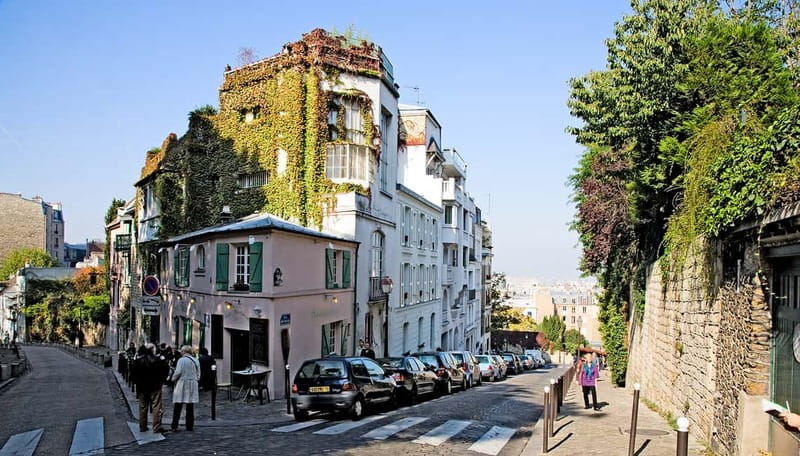 Paris: Montmartre Hidden Gems and Highlights Walking Tour - Rue des Abbesses and the small details that make Montmartre feel human