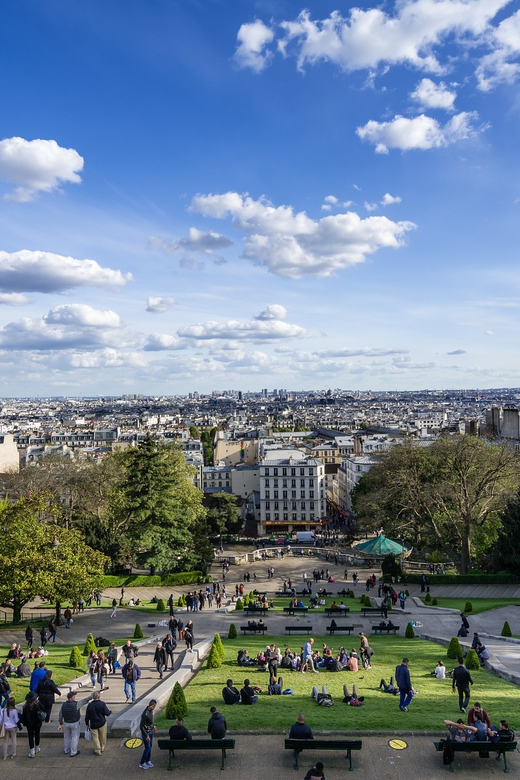 Paris: Montmartre Highlights Walking Tour with a Local Guide - Moulin de la Galette: The Windmill Icon and Impressionist Memory