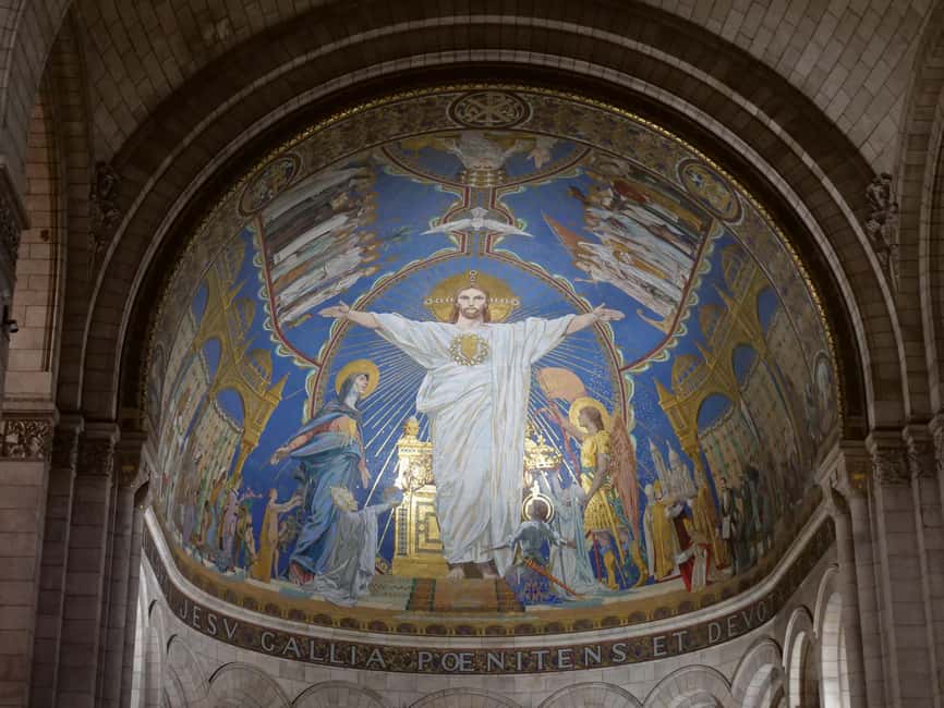 Paris: Montmartre Must-See Walking Tour with a Local Guide - Vignes du Clos Montmartre and Moulin de la Galette: unexpected Paris traditions