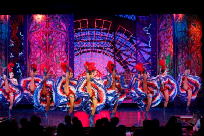 Paris: Moulin Rouge Show with Champagne and Drop-Off Service - Féerie Revue at the Moulin Rouge: Big Cast, Big Costume Work