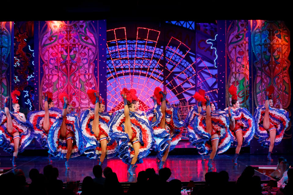 Paris: Moulin Rouge Show with Champagne and Drop-Off Service - Féerie Revue at the Moulin Rouge: Big Cast, Big Costume Work