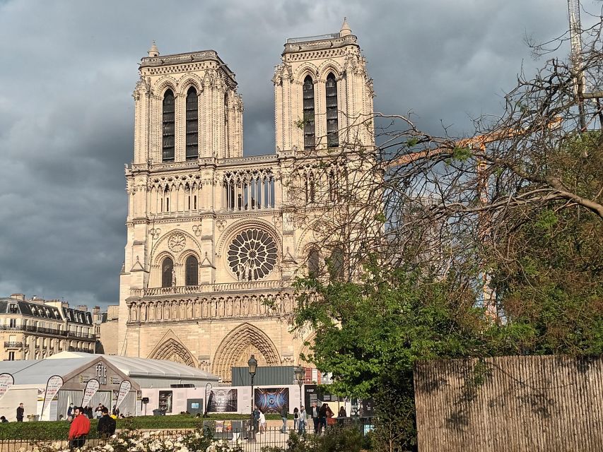 Paris: Notre Dame Exterior Walking Tour with Sainte Chapelle - Place Dauphine and Pont Neuf: Henry IV’s City Design in Two Beautiful Stops