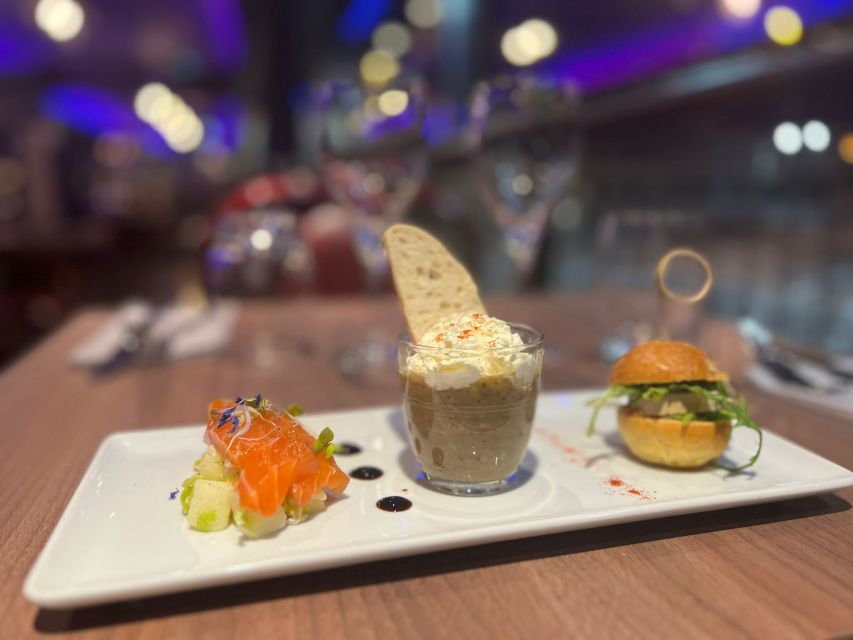 Paris: Seine River Bistronomic Dinner Cruise - Table service and the outdoor deck: where you’ll spend your time