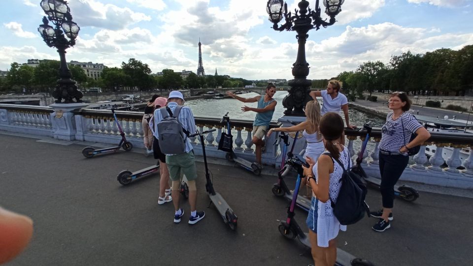 Paris: Small-Group E-Scooter Tour with a Local Guide - Pont des Arts to the Louvre Courtyard: the best kind of first stop