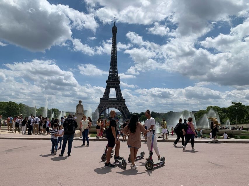 Paris: Small-Group E-Scooter Tour with a Local Guide - Arc de Triomphe and the Eiffel Tower: big landmarks, no marathon