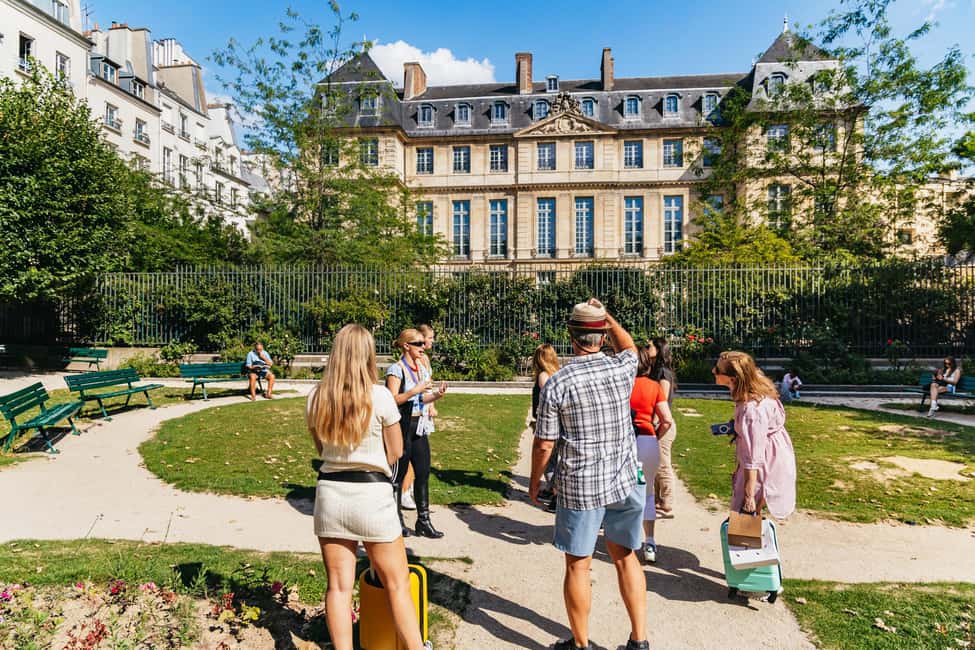 Paris: Walking Food Tour with Cheese, Wine and Delicacies - Meeting Le Repaire de Bacchus and Getting Oriented in the Marais